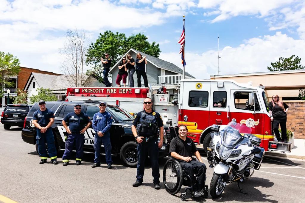 Prescott Regional Communications Center PRCC staff with fire engine and vehicles.